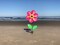 In the Breeze 2694 - 19 Inch Pink Sunflower Wind Spinner with Leaves - Colorful Flower for your Yard and Garden